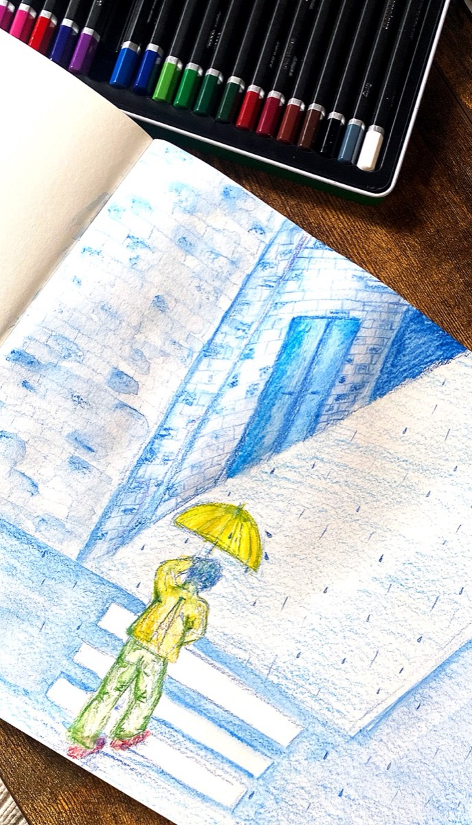 Coloured pencil sketch of a figure holding a yellow umbrella in the rain